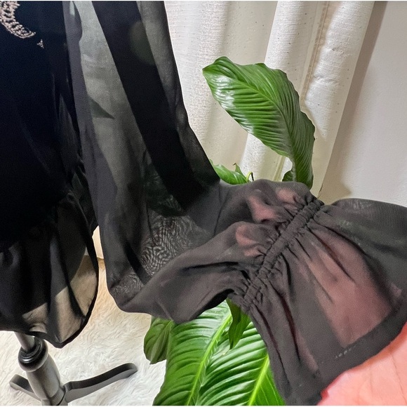 - Embroidered Mesh Peplum Top - Picture 7 of 12